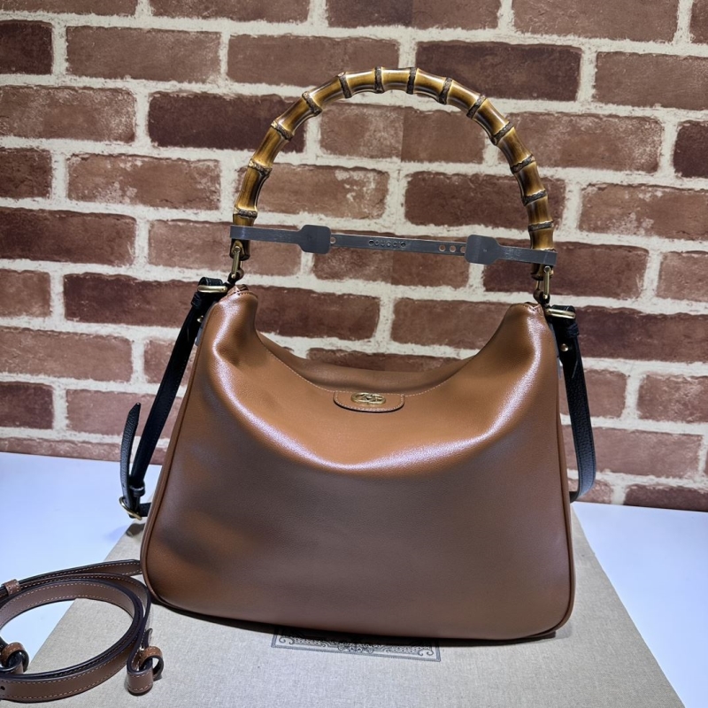 G*u*i top handle bags